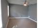 Neutral bedroom with a ceiling fan and a window at 6832 Shangrila Way, Riverdale, GA 30296