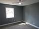 Neutral bedroom with a ceiling fan and a window at 6832 Shangrila Way, Riverdale, GA 30296