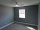 Neutral bedroom with a ceiling fan and a window at 6832 Shangrila Way, Riverdale, GA 30296