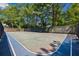 Community basketball court surrounded by mature trees, offering a recreational amenity at 2106 Clairmeade Valley Ne Rd, Atlanta, GA 30329