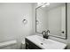 Bathroom featuring a dark vanity, white countertop, and black hardware at 2106 Clairmeade Valley Ne Rd, Atlanta, GA 30329