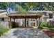 Exterior view of a townhome with a carport and a privacy fence at 2106 Clairmeade Valley Ne Rd, Atlanta, GA 30329