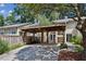 Exterior of a townhome with a shaded carport and private patio at 2106 Clairmeade Valley Ne Rd, Atlanta, GA 30329