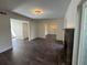 Living room with stone fireplace and hardwood-style floors at 2106 Clairmeade Valley Ne Rd, Atlanta, GA 30329