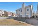 Rear exterior view of property, including backyard, patio and chimney at 3158 Onamia Rd, Duluth, GA 30096