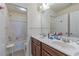 Functional bathroom with double vanity, tub, and bright lighting, offering convenience for daily routines at 3158 Onamia Rd, Duluth, GA 30096