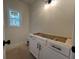 Bathroom featuring modern vanity with black hardware and natural light at 554 Presley Farm Pkwy, Rockmart, GA 30153
