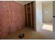 Bathroom in progress with wood frame wall and window view at 554 Presley Farm Pkwy, Rockmart, GA 30153