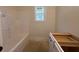 Bathroom featuring modern tub, white walls, and modern vanity at 554 Presley Farm Pkwy, Rockmart, GA 30153