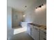 Bright bathroom featuring dual vanities and stylish lighting at 554 Presley Farm Pkwy, Rockmart, GA 30153