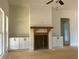 Living room fireplace featuring a wooden mantle and built-in cabinets for stylish storage at 554 Presley Farm Pkwy, Rockmart, GA 30153