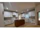 White cabinets offer ample storage in the spacious kitchen at 554 Presley Farm Pkwy, Rockmart, GA 30153