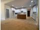 Spacious kitchen with white cabinets and a central island at 554 Presley Farm Pkwy, Rockmart, GA 30153