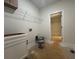 Mudroom with white cabinets and wire rack shelving at 554 Presley Farm Pkwy, Rockmart, GA 30153