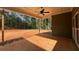 Covered patio overlooking a large backyard at 554 Presley Farm Pkwy, Rockmart, GA 30153