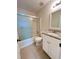 Updated bathroom with shower and tub combination at 1418 Brookside Manor Ct, Tucker, GA 30084