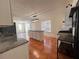 Bright kitchen features an island with granite counters, a tile backsplash, and stainless appliances at 1418 Brookside Manor Ct, Tucker, GA 30084