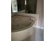 Bathroom featuring a large jacuzzi tub with tile backsplash at 2720 Sandy Creek Cir, Loganville, GA 30052