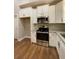 Well-lit kitchen featuring stainless steel appliances and granite countertops at 642 Presley Farm Pkwy, Rockmart, GA 30153