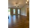 Bright and airy living room with hardwood floors and neutral colors at 642 Presley Farm Pkwy, Rockmart, GA 30153