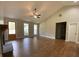 Spacious living room with a fireplace, vaulted ceilings, and hardwood floors at 642 Presley Farm Pkwy, Rockmart, GA 30153