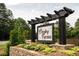 Presley Farms sign with a beautiful stone base and greenery at 642 Presley Farm Pkwy, Rockmart, GA 30153