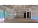 Spacious kitchen area with an exterior door and a window for natural light at 642 Presley Farm Pkwy, Rockmart, GA 30153