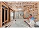 Unfinished basement with exposed ceiling and framed walls at 1755 Riverpark Dr, Dacula, GA 30019
