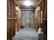 Unfinished basement space with exposed framing, concrete walls, and visible utilities at 1755 Riverpark Dr, Dacula, GA 30019
