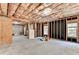 Unfinished basement with exposed ceiling at 1755 Riverpark Dr, Dacula, GA 30019