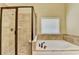 Bathroom with separate shower and jacuzzi tub at 1755 Riverpark Dr, Dacula, GA 30019
