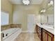 Bright bathroom with tub, shower, double vanity at 1755 Riverpark Dr, Dacula, GA 30019
