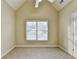 Comfortable bedroom with vaulted ceiling, fan, neutral walls, and a double window at 1755 Riverpark Dr, Dacula, GA 30019