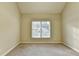 Neutral bedroom featuring carpet and a window that provides a blank canvas to personalize at 1755 Riverpark Dr, Dacula, GA 30019