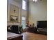 Sunlit bedroom featuring a fireplace, high ceiling and large windows at 1755 Riverpark Dr, Dacula, GA 30019