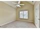Bedroom featuring plush carpeting, a neutral color scheme, and a ceiling fan at 1755 Riverpark Dr, Dacula, GA 30019