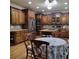 Gourmet kitchen with stainless steel appliances, granite countertops, and custom cabinets at 1755 Riverpark Dr, Dacula, GA 30019