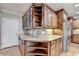 Kitchen with granite counters, custom cabinetry, and stainless steel refrigerator at 1755 Riverpark Dr, Dacula, GA 30019