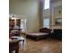 View of kitchen and living room featuring hardwood flooring and a fireplace at 1755 Riverpark Dr, Dacula, GA 30019