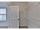 Walk-in closet with carpet and metal shelving at 4320 Sims Park Overlook, Suwanee, GA 30024