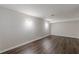 Spacious finished basement featuring luxury vinyl plank flooring, neutral paint, and recessed lighting at 3025 Creel Rd, Atlanta, GA 30349
