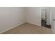 Neutral bedroom with carpet floor and view into bathroom at 3025 Creel Rd, Atlanta, GA 30349