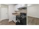 Kitchen featuring modern appliances and cabinetry, and sleek countertops at 3025 Creel Rd, Atlanta, GA 30349
