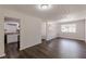 Spacious living area with hardwood floors, natural light, and easy kitchen access at 3025 Creel Rd, Atlanta, GA 30349