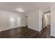 Bright living area with French doors and updated flooring and paint at 3025 Creel Rd, Atlanta, GA 30349