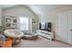 Bright room with comfortable furniture, including shelving for ample storage at 5315 Hidden Valley Ln, Cumming, GA 30028
