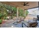 Covered patio featuring comfortable seating and an outdoor rug, perfect for relaxation at 5315 Hidden Valley Ln, Cumming, GA 30028