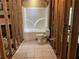 Bathroom features a new tub and toilet, ready for finishing touches at 6245 Bannister Rd, Cumming, GA 30028