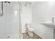 Bathroom featuring a glass door shower with white subway tile and gray floor at 7880 Rivertown Rd, Atlanta, GA 30213