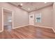 Inviting living room showcasing hardwood floors and neutral paint, ready for your personal touch at 7880 Rivertown Rd, Atlanta, GA 30213